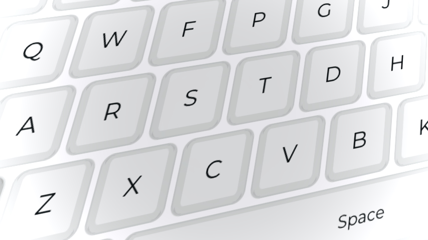 My Iris keyboard with visible letter keys placed in the Colemak layout.